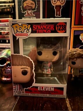 Funko Stranger Things Pop Box Art with Black, Red, White and Brown Accents